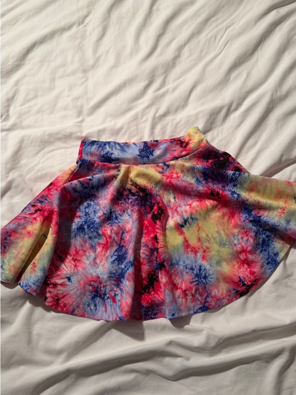 2 mini skater skirts: plaid and tie dye